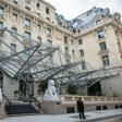 Thieves smashed display cases holding jewels and clothing at the Peninsula hotel in Paris while holding employees at gunpoint
