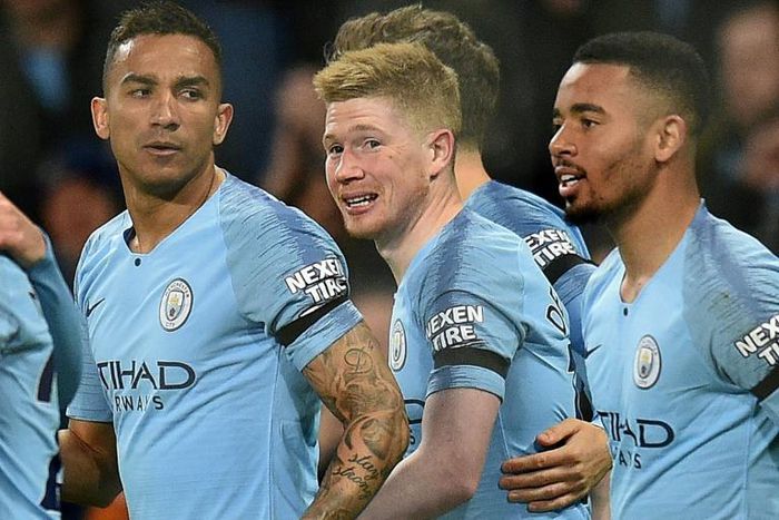 Kevin De Bruyne (centre) celebrates scoring Manchester City's opening goal against Cardiff