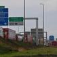 The men arrived at the Calais entrance to the Channel Tunnel linking France to England in a van filled with coffins, one of which contained an Iraqi migrant