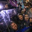 Security forces in riot gear pushed the crowds of women -- some wearing colourful wigs and masks -- at the entrance to the city's main pedestrianised shopping street