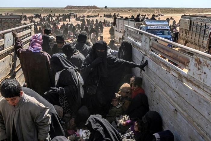 Tens of thousands of women, children and men have poured out of the Islamic State group's last scrap of territory in eastern Syria since December and thousands more are still believed to be inside