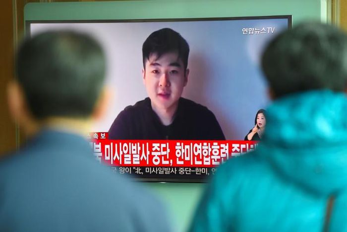 South Koreans watch a TV news item showing video footage Kim Han-Sol, a nephew of North Korea's leader Kim Jong-Un