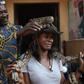 A tourist carrying a snake at Temple des pythons [Black feelings]
