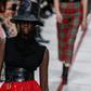 Get ahead... A model wears a bucket hat and leather cumberband at the Dior's tartan-heavy Paris autumn winter show