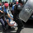 Nicaraguan riot police briefly arrested around 100 people during the weekend demonstrations, prompting the opposition alliance to withdraw from peace talks
