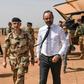 French Prime Minister Edouard Philippe, flanked by General Frederic Blachon, commander of the Barkane force, said Paris' partners must commit to the long haul to end jihadist violence in the Sahel