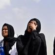 Grief: Relatives arrive at the site