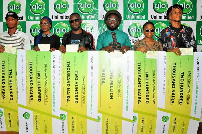 (L-R): Nwogwugwu Braine, Doyin Hafeezah Salau, John Sunday Peter, Ejembi Simon Inass, Shaka Aaleeyah Ehimare and Emeh Emmanuel Okwun during the presentation of prizes to grand finale winners in Gloin60seconds online contest held at Mike Adenuga Towers ...