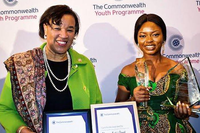 L-R: Patricia Scotland, the Commonwealth secretary-general and Ayodeji Osowobi with her awards at the Marlborough House, the Commonwealth Secretariat’s London headquarters on Wednesday, March 13, 2019. (The Cable)