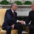 US President Donald Trump shakes hands with NATO Secretary General Jens Stoltenberg at the White House