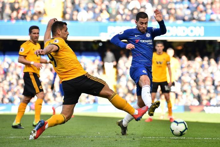 Wolverhampton's Raul Jimenez challenges Chelsea's Eden Hazard