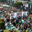 Algerian protesters gather during a mass demonstration against ailing President Abdelaziz Bouteflika in the capital Algiers on March 29, 2019
