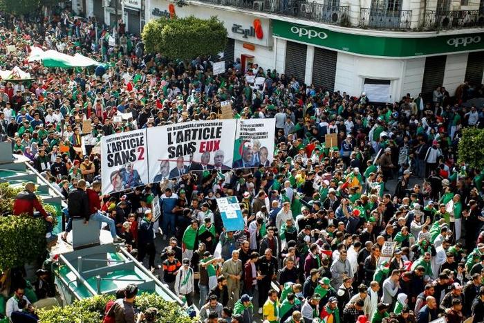 Algerian protesters gather during a mass demonstration against ailing President Abdelaziz Bouteflika in the capital Algiers on March 29, 2019