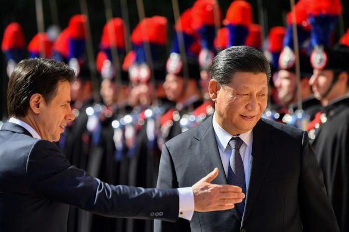 Italy’s Prime Minister Giuseppe Conte welcomes Chinese President Xi Jinping, who has wooed the Group of Seven nation into China's Silk Road infrastructure mega-project