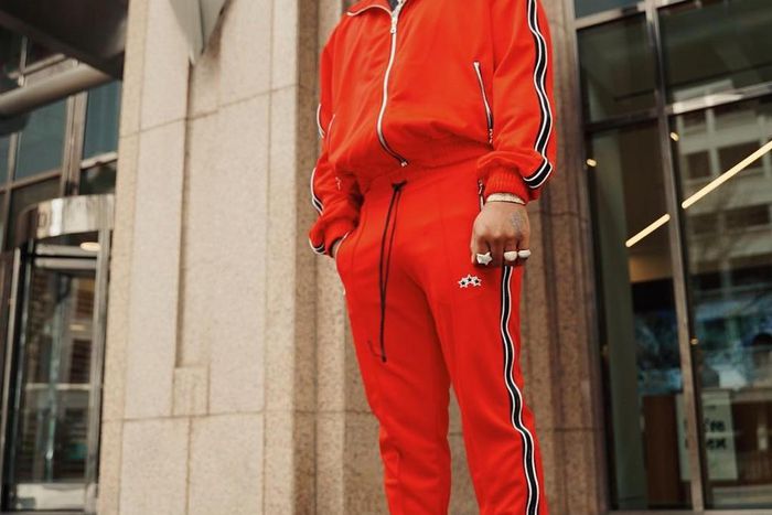 Davido displayed how much he appreciates a member of his crew with a new red benz. [Instagram/davidoofficial]