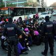 Demonstrators in Barcelona blocked a major thoroughfare, some wearing purple wigs -- the colour long associated with gender equality