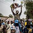Supporters of President Muhammadu Buhari celebrated his election victory last month, but the violence that marred some polls that have had to be re-run appeared to have returned Saturday