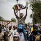 Supporters of President Muhammadu Buhari celebrated his election victory last month, but the violence that marred some polls that have had to be re-run appeared to have returned Saturday