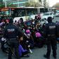 Demonstrators in Barcelona blocked a major thoroughfare, some wearing purple wigs -- the colour long associated with gender equality