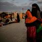 A veiled woman looks back at Al-Hol camp in northeastern Syria in this file picture taken on February 17, 2019