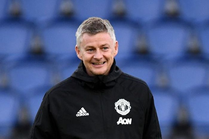 Manchester United manager Ole Gunnar Solskjær watching his side train in Paris on Tuesday - he remains upbeat ahead of the second leg of their Champions League last-16 tie against PSG
