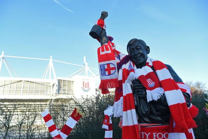 A statue of former England goalkeeper Gordon Banks is draped in scarves