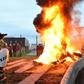 The guards set fires outside the high-security facility at Conde-sur-Sarthe in Normandy
