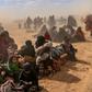 Thousands of people have flooded out of the last patch of Islamic State group territory in Syria in recent days