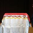 The coffin with the remains of an Aboriginal ancestral king is draped with an Aborginal flag as the Five Continents museum in Munich handed it over to Australia