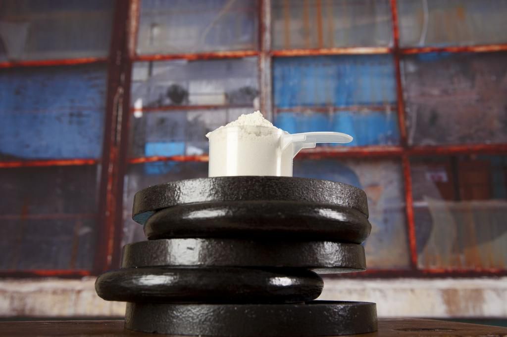 Barbell weights and protein powder