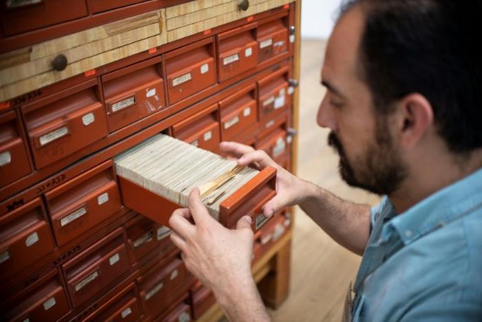 A historian works at the General Archive of the Nation, in Mexico City, on March 13, 2019, after the recent declassification of the archives of the Mexican intelligence service