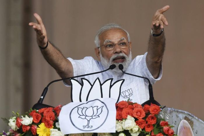 Indian Prime Minister Narendra Modi gestures during a campaign rally in Kolkata on Wednesday