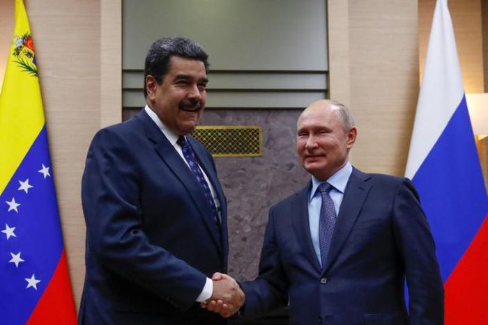 Moscow sent two TU-160 bombers to Venezuela December 2018 days after Russian President Vladimir Putin (R) met with Venezuela's Nicolas Maduro met in Moscow
