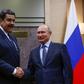 Moscow sent two TU-160 bombers to Venezuela December 2018 days after Russian President Vladimir Putin (R) met with Venezuela's Nicolas Maduro met in Moscow