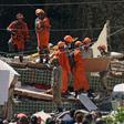 Rescue workers at the site where two buildings collapsed in Muzema, Rio de Janeiro, Brazil, on April 12, 2019