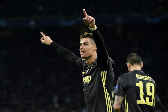 Cristiano Ronaldo celebrates after giving Juventus the lead against Ajax in their Champions League quarter-final first leg
