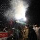 Pakistanis in Karachi celebrate the shooting down of two Indian fighter jets by the Pakistan Air Force