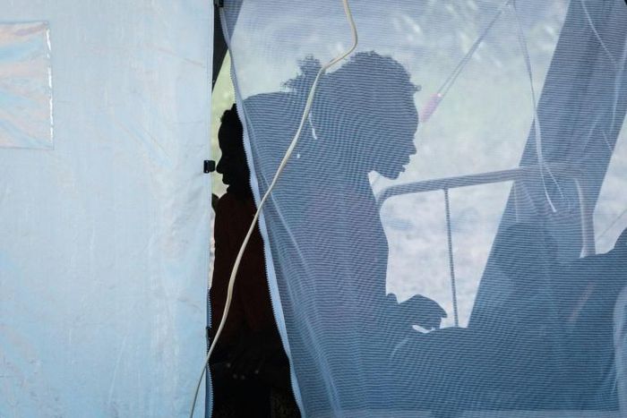 Patients with diarrhoea are seen at a treatment tent at Macurungo health centre in Beira, where at least 139 cholera cases have been reported, as health workers struggle with the cyclone aftermath
