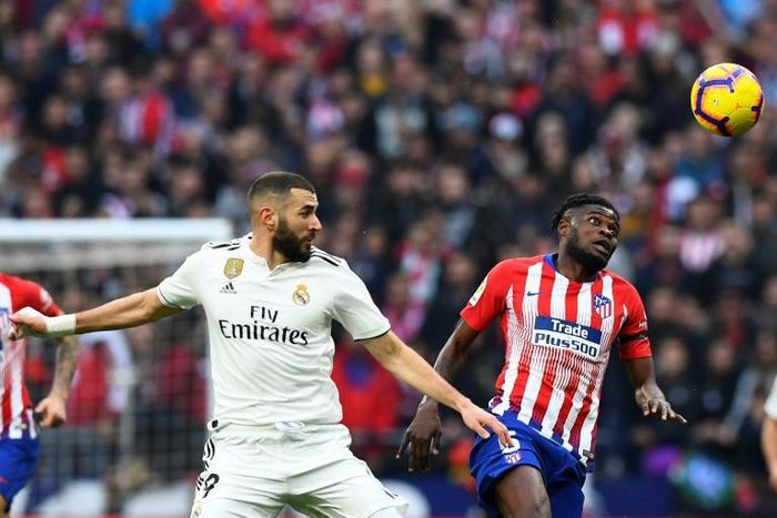 Atletico Madrid midfielder Thomas, right, and Real Madrid forward Karim Benzema will see their clubs meet next July in East Rutherford, New Jersey, in the International Champions Cup