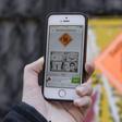 Walking through the streets of Athens, visitors look for the brightly-coloured QR code which they then scan to get a short description of the attack that took place there