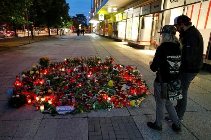 Local people created a makeshift shrine to victim Daniel Hillig