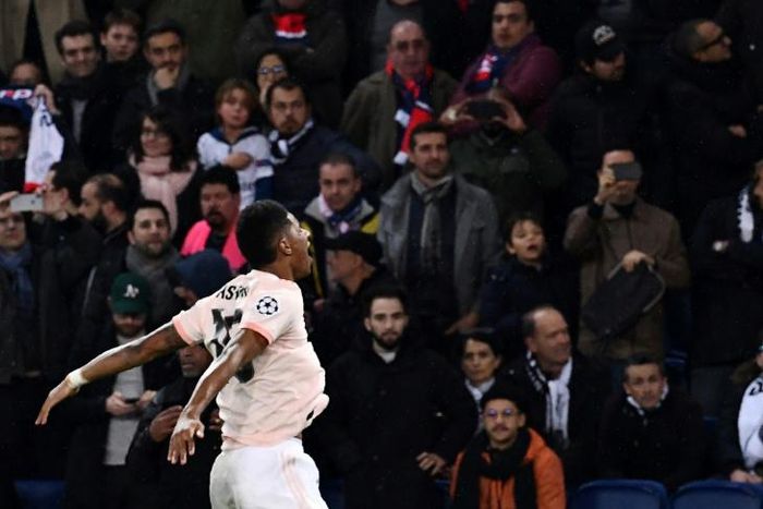 Spot on: Marcus Rashford scored a stoppage time penalty to take Manchester United into the Champions League quarter-finals at PSG's expense