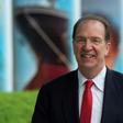 David Malpass walks to the World Bank on his first day as the new president of the global lender