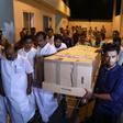 The body of Ansi Alibava, who was killed during the New Zealand mosque attacks, is carried upon arrival at Cochin International Airport in Kerala, India