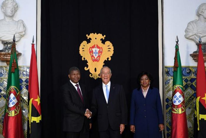 Angolan President Joao Lourenco paid a landmark visit to Lisbon in November meeting Portuguese president Marcelo Rebelo de Sousa (C)