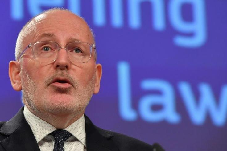 European First Vice-President Frans Timmermans, pictured, has hit back at accusations of political bias from Poland's right-wing government