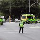 Ambulances rush towards one of the two mosques in Christchurch where a right-wing extremist armed with semi-automatic weapons rampaged during afternoon prayers
