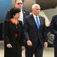 US Vice President Mike Pence (C) is welcomed by Colombia's Foreign Affairs Vice Minister Luz Stella Jara (L) and Colombia's Air Force General Luis Carlos Cordoba, upon arrival in Bogota, on February 25, 2019