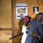 Ethnic Tutsi Jean-Bosco Gakwenzire (in the hat), 65, embraces Pascal Shyirahwamaboko, 68, who was among the killers of his father at Mutete, where the old schoolfriends have now reconciled