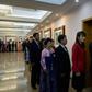 Voters queue to cast their ballots at the '3.26 Pyongyang Cable Factory' during voting for the Supreme People's Assembly elections in Pyongyang